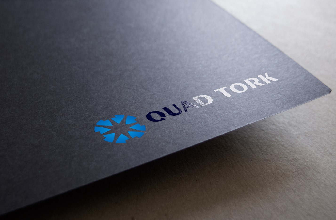 Quad Tork 公司logo設(shè)計(jì)